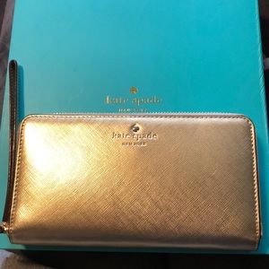 NWT Kate Spade universal zip wristlet, gold